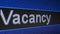 Ticker board with running text Vacancy