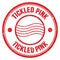 TICKLED PINK text written on red round postal stamp sign