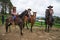 Tico farmer in Costa Rica on horses