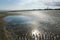 Tidal Flats on North Beach With Historic Tybee Island Light Station