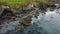 Tidal waves of the Atlantic Ocean near the southern coast of the island of Ireland. Rocky seashore. Seascape, top view. View from