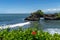 Tidal waves breaking on the coast of Hindu Tanah Lot Temple complex on Bali island, Indonesia