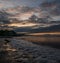 The tide on a beach in Sopela