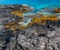 Tide Pools and Ancient Lava Flow on The Shore of Puialoa Point