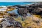 Tide Pools and Ancient Lava Flow on The Shore of Puialoa Point