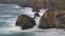 Tide rushes over rocks near the Bedruthian Steps, Cornwall