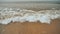 The tide of the waves of the Arabian Sea off the coast of Goa. India. Slow motion view.