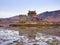 Tides in the lake at Eilean Donan Castle, Scotland. The popular stony bridge