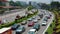 Tie rod on a highway in Asia. A large number of vehicles have caused a traffic jam