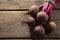 Tied beetroot of wooden table
