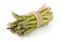 Tied bundle of fresh cut raw, uncooked green asparagus vegetable