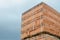 Tied Bundle of Red Bricks Against Sky