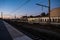 Tienen, Flanders, Belgium - Platform and railway tracks of the local train station during a colorful sunset