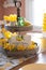 Tiered tray decorated in yellow for Spring