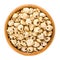 Tiger nuts, earth almonds, dried, in wooden bowl