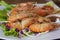 Tiger shrimp prawns with fresh lettuce in plate