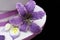 Tigerlily orchid in purple with calla lillies on a wedding cake