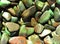 Tigers Eye Tumbled Rocks Background