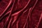 tight close-up shot of burgundy velvet cloth
