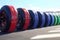 A tight closeup of a racing cars tires as they grip the track while drifting. Speed drive concept. AI generation