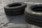 A tight closeup of a racing cars tires as they grip the track while drifting. Speed drive concept. AI generation