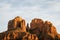 Tight shot zoomed in photograph of Cathedral rock in Sedona Arizona showing more detail of the red rock at sunset in the month of