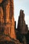 Tight shot zoomed in photograph of Cathedral rock in Sedona Arizona showing more detail of the red rock at sunset in the month of