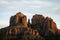 Tight shot zoomed in photograph of Cathedral rock in Sedona Arizona showing more detail of the red rock at sunset in the month of