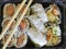 Tightly packed sushi rolls on platter