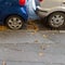 Tightly parked cars on the street