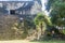 TIKAL, GUATEMALA - MARCH 14, 2016: Workers maintain the ruins of Complex P at the archaeological site Tikal, Guatema