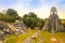 Tikal National Park on Unesco World Heritage. The Grand Plaza with the North Acropolis and Temple I Great Jaguar Temple