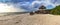 Tiki hut Boardwalk leads down to the white sand of Barefoot Beach in Bonita Springs