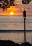 Tiki torch at sunset