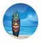 Tiki warrior mask design surfboard on ocean beach