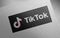 Tiktok-banner-black-3_1 on paper texture