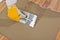 Tile adhesive notched trowel