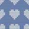 Tile knitting vector pattern with white hearts on blue background