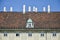 Tile roof medieval building of the winter residence of the Austrian imperial court of Hofburg