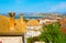 The tile roofs, chimneys and dome of Trianon old mosque, Nafplio, Greece