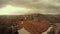 Tile roofs top view on Ankara far turkish flag cloudy day