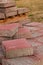 Tile stone red laying garden walkway vertical photo building background