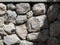 Tileable Stone wall texture seamless in half dark shadow