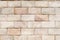 Tiled brick wall in light sepia beige black white tone texture background for interiors design home, house.