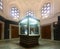 Tiled Kiosk interior in Topkapi Palace with glass display stands, Istanbul, Turkey