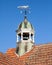 Tiled Orange Roof with Bell Tower and Fox Weather Vane