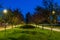 The tiled road in the night park with lanterns with Japanese che