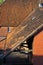 Tiled roofs of house and shed.