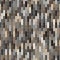 Tiled surface with multicolored rectangular tiles arranged in vertical lines. Ceramic mosaic style. Seamless geometric pattern.