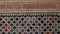 Tiles and plaster ornamentation in Patio de los Arrayanes, Comares Palace, Alhambra, Granada, Spain.